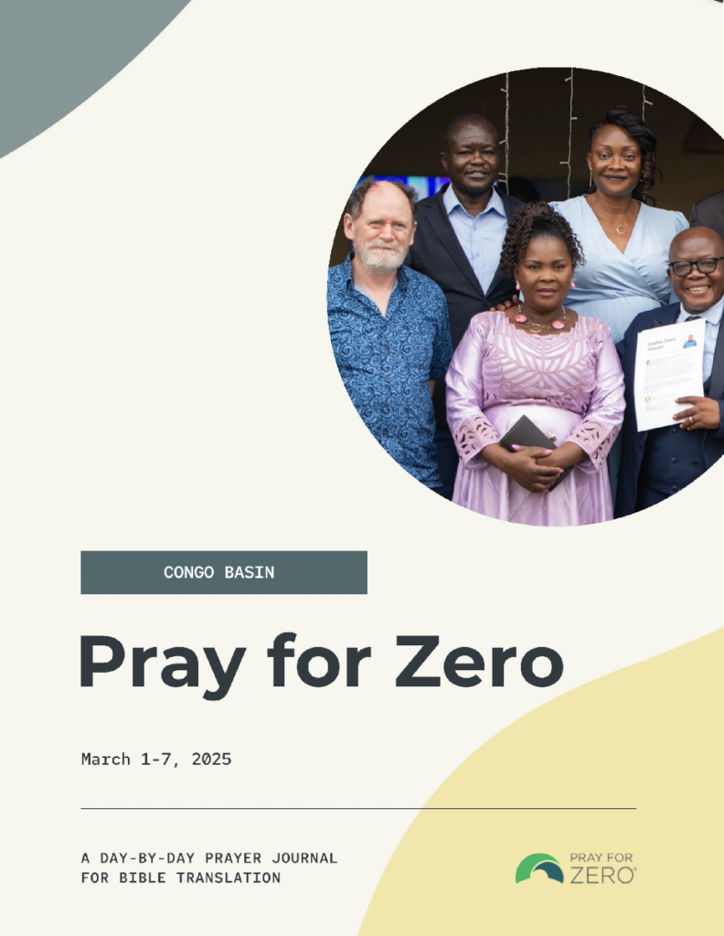 Group of men and women standing together at a Bible translation event in the Congo Basin, featured in the Pray for Zero Journal (March 1-7, 2025).